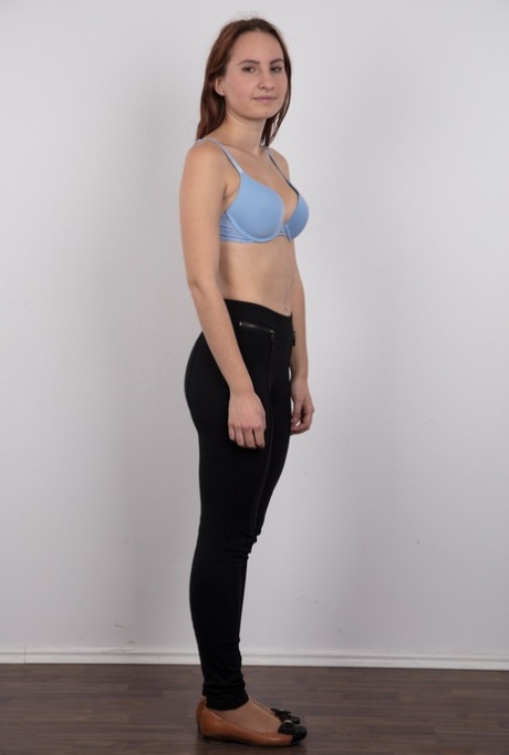 Czechoslovakian amateur Anastazie slowly gets completely naked by herself