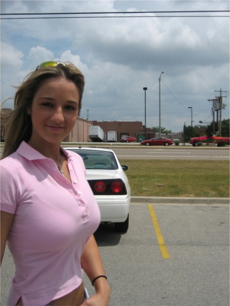 Amateur girl Nikki Sims strips to her underwear inside a vehicle