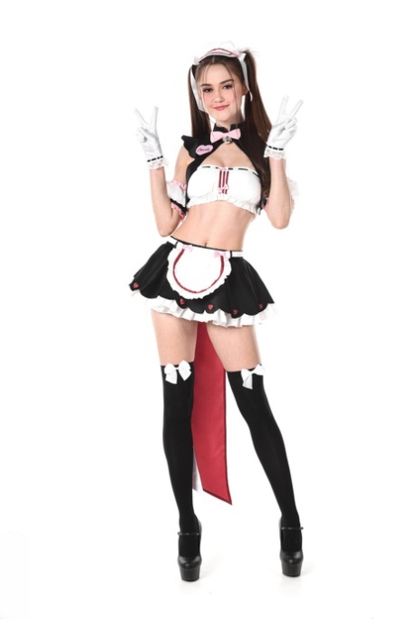 Cute girl Sonya Blaze models naughty maid apparel before dildoing her pussy