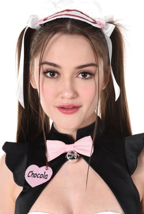Cute girl Sonya Blaze models naughty maid apparel before dildoing her pussy