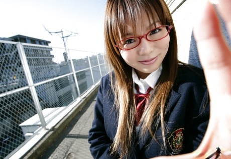 Nasty asian schoolgirl Yume Kimino taking off her skirt and panties