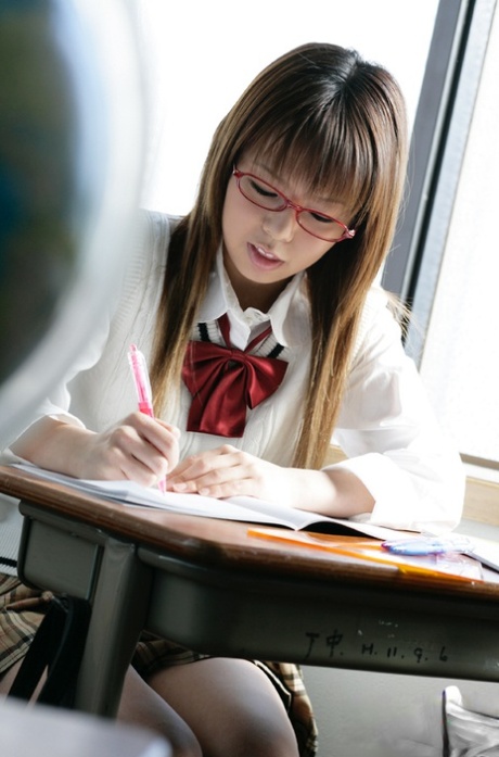 Nasty asian schoolgirl Yume Kimino taking off her skirt and panties