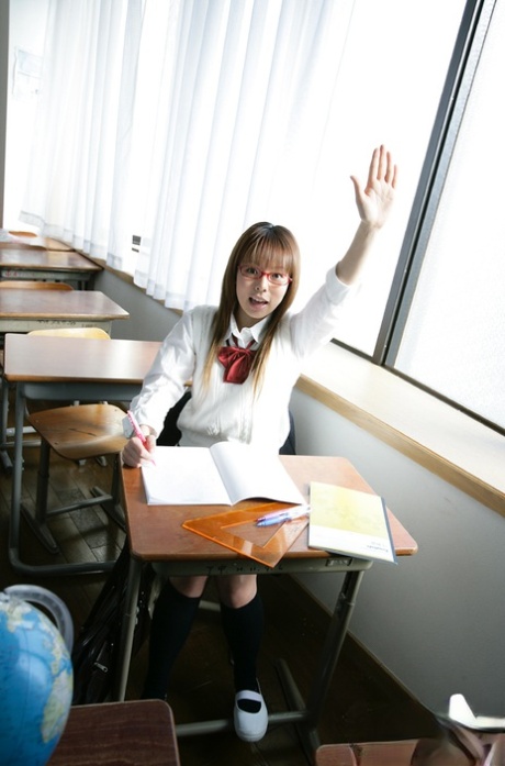 Nasty asian schoolgirl Yume Kimino taking off her skirt and panties