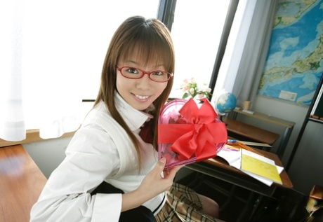 Nasty asian schoolgirl Yume Kimino taking off her skirt and panties