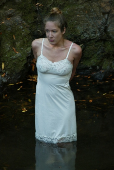 Busty virgin gets schooled by a blonde lezdom in outdoor water bondage action