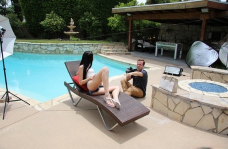Brunette Marley Brinx lifts her legs up and gets her butthole stuffed poolside