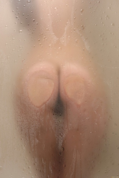 Babe with small boobs and amazing ass Cecelia flaunts her bush in the shower
