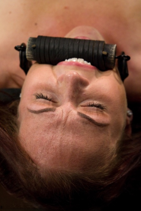 Redhead MILF Josi gets her tight pussy fisted in stock & pillory BDSM action