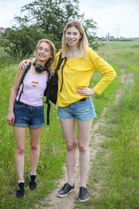 Lesbian pals Milena Devi & Candy Teen lick each other's cunt while out hiking