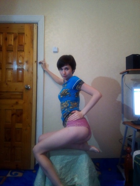 Skinny amateur shows off her pink pussy & tight ass in a homemade solo show
