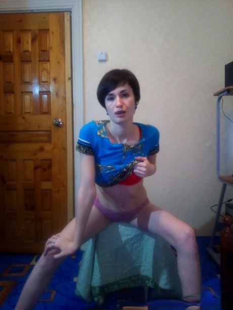 Skinny amateur shows off her pink pussy & tight ass in a homemade solo show