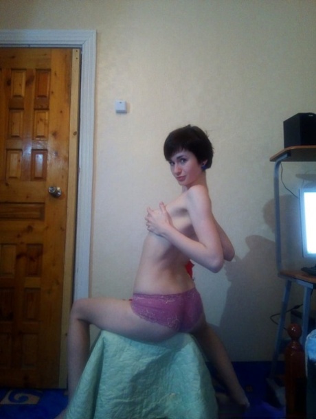Skinny amateur shows off her pink pussy & tight ass in a homemade solo show