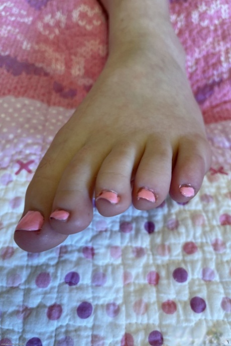 Sweet amateur teen Adrianna Jade reveals her pink pussy and poses naked